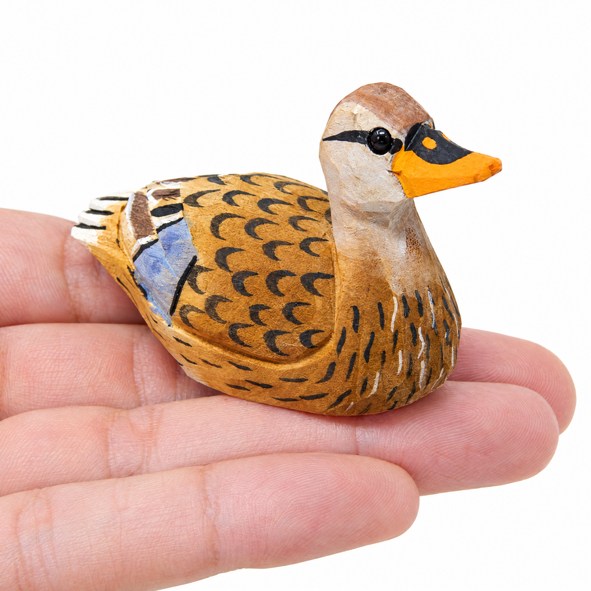 Mallard Duck Female hand-carved wooden figurine by Selsela, on a plain background