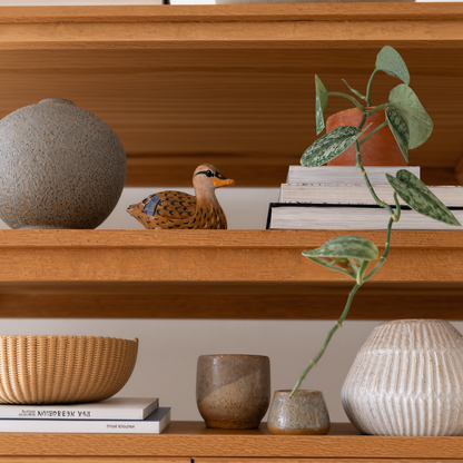 Mallard Duck Female hand-carved wooden figurine by Selsela, styled in a home setting