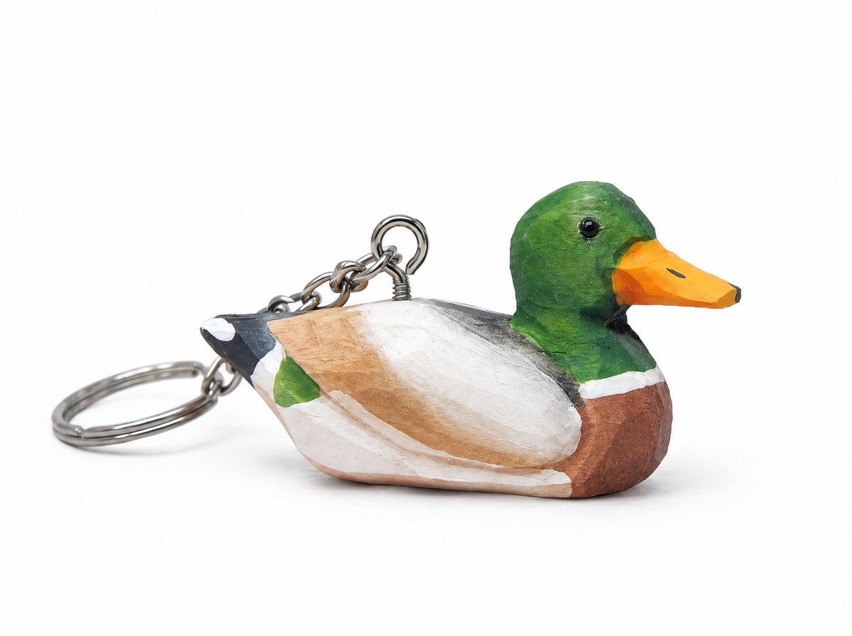 Mallard Duck Male hand-carved wooden keychain by Selsela, on a plain background