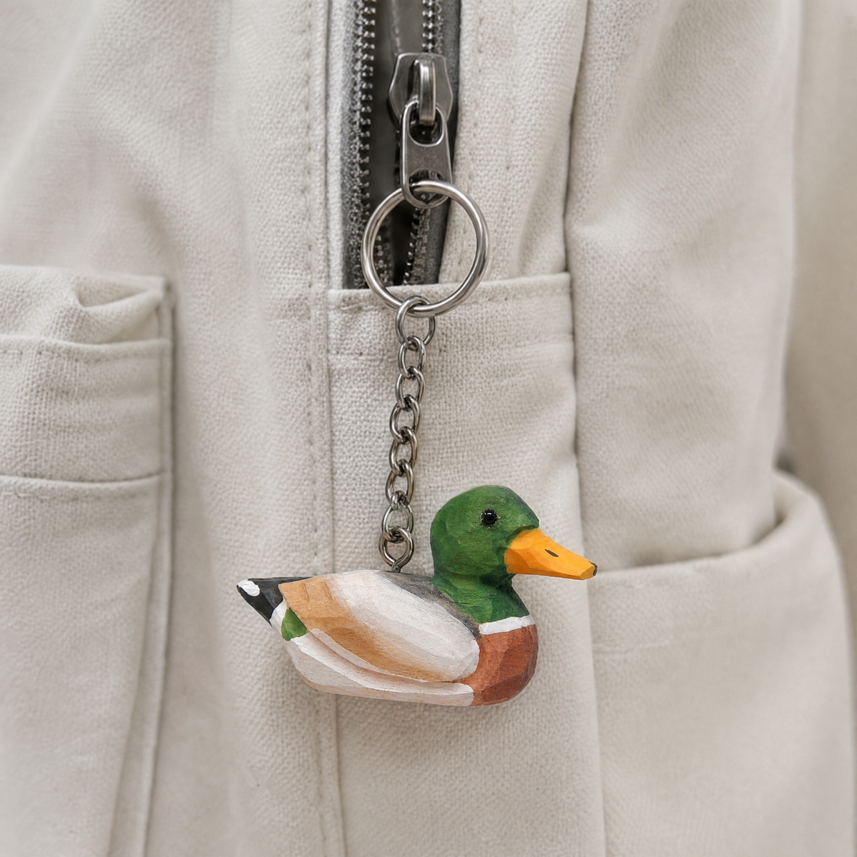 Mallard Duck Male hand-carved wooden keychain by Selsela, in a styled scene
