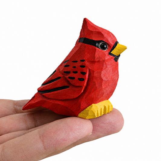 Cardinal Male hand-carved wooden figurine by Selsela, on a plain background