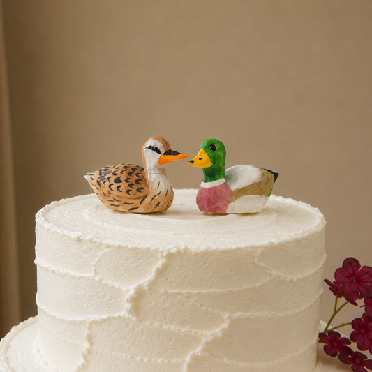 Mallard Duck Female hand-carved wooden cake topper by Selsela, bride and groom pair on a wedding cake