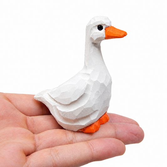 White Goose hand-carved wooden figurine by Selsela, on a plain background