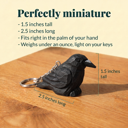 Raven hand-carved wooden keychain by Selsela, with size measurements