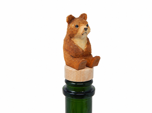 Brown Bear Grizzly hand-carved wooden wine stopper by Selsela, on a plain background