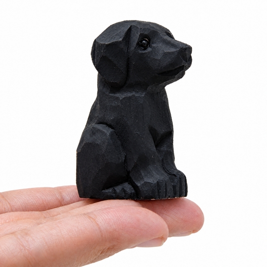 Labrador Retriever Black hand-carved wooden figurine by Selsela, on a plain background