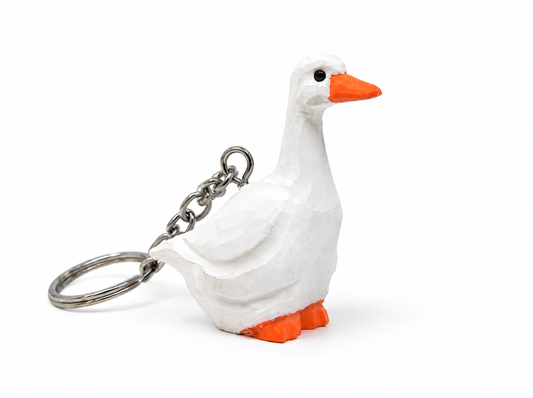 White Goose hand-carved wooden keychain by Selsela, on a plain background