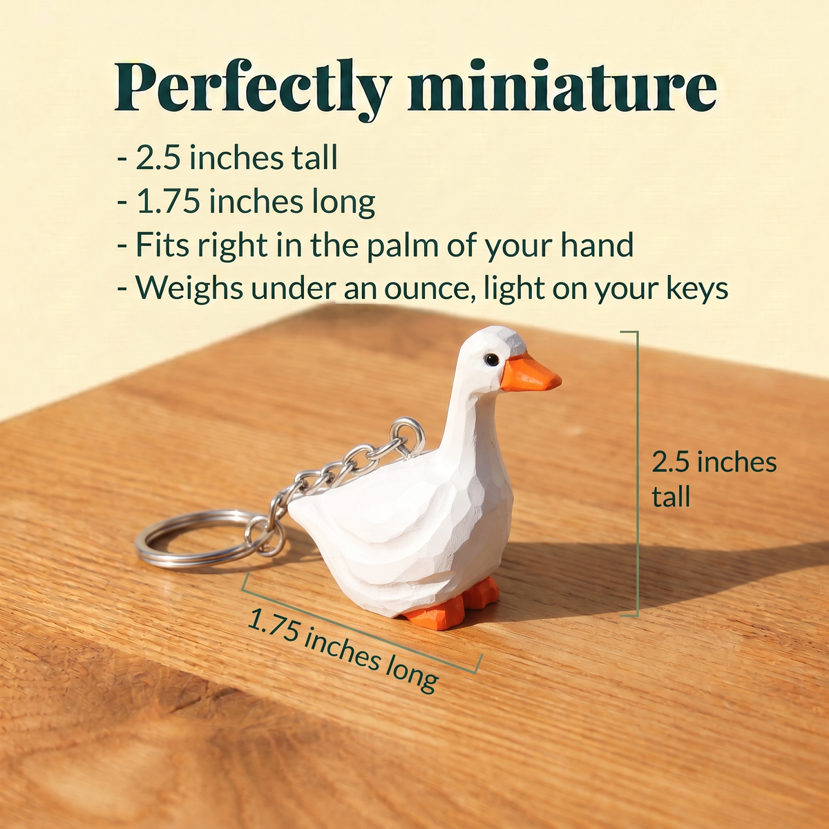 White Goose hand-carved wooden keychain by Selsela, with size measurements