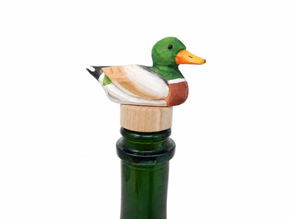 Mallard Duck Male hand-carved wooden wine stopper by Selsela, on a plain background