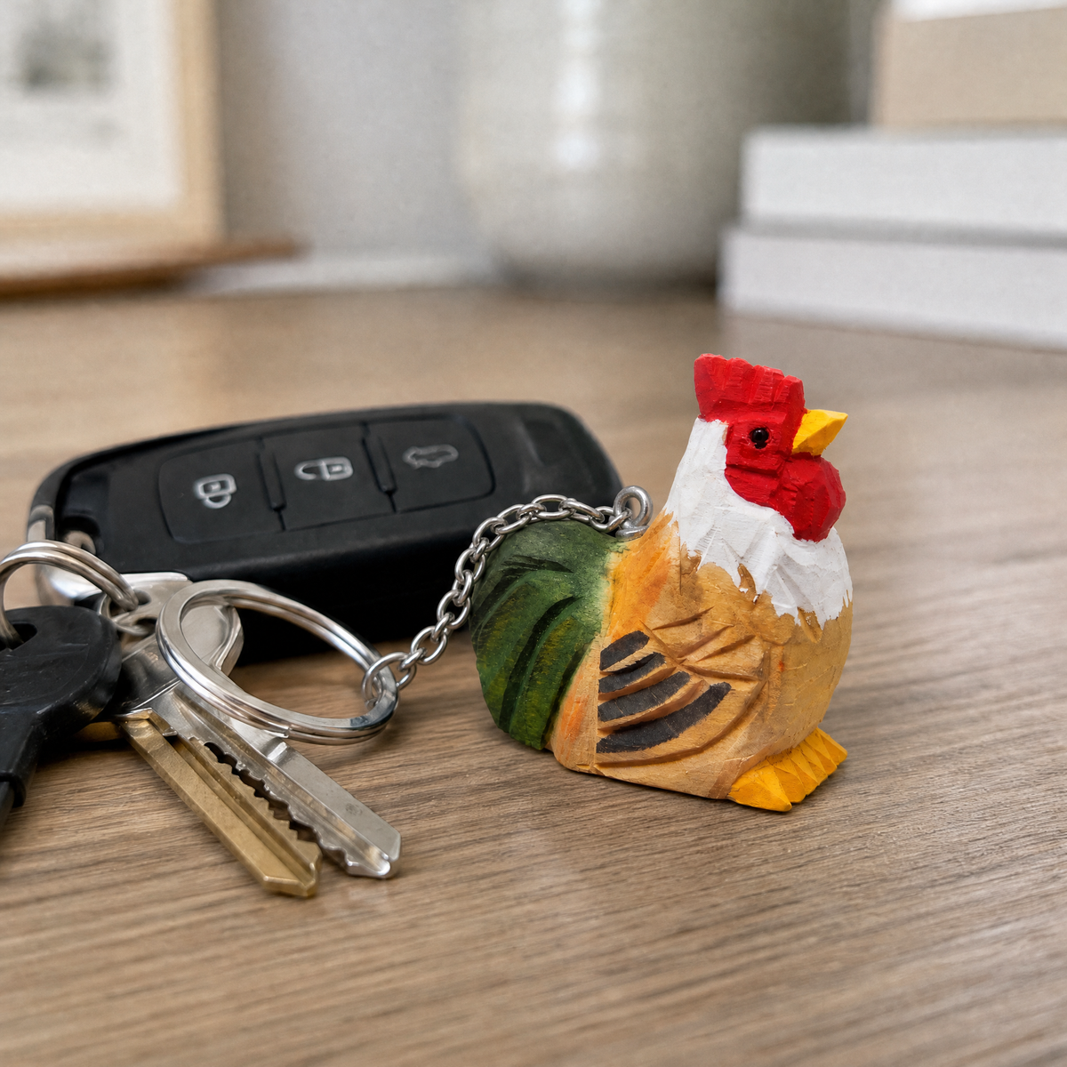 Rooster hand-carved wooden keychain by Selsela, in a styled scene