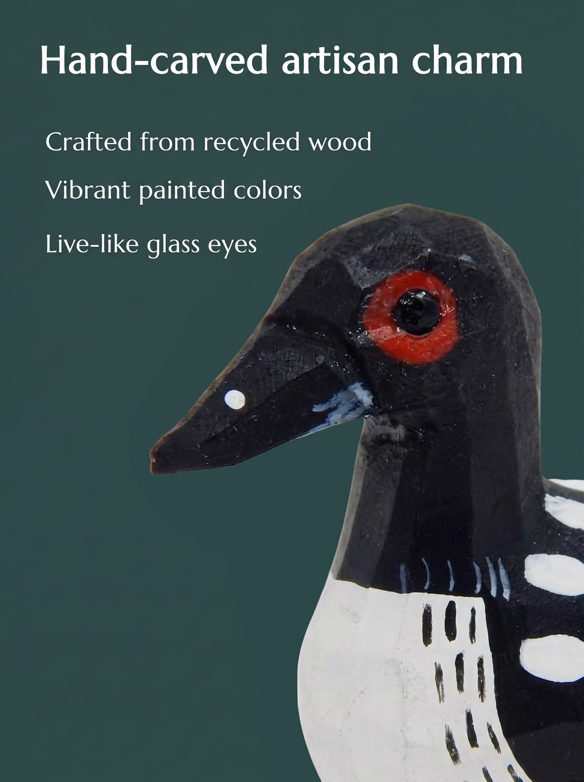 Common Loon hand-carved wooden keychain by Selsela, close-up of the hand-carved detail