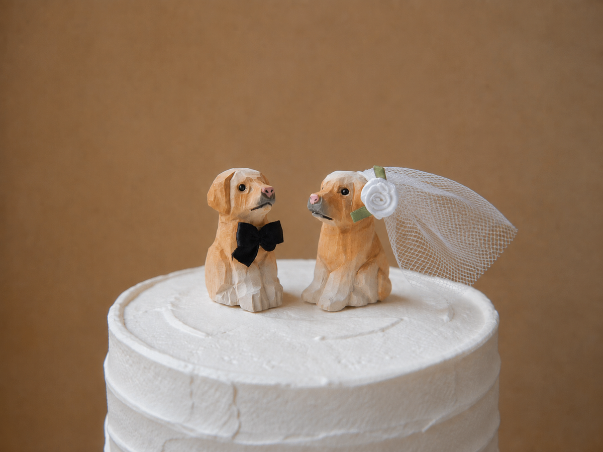 Labrador Retriever Brown hand-carved wooden cake topper by Selsela, bride and groom pair on a wedding cake