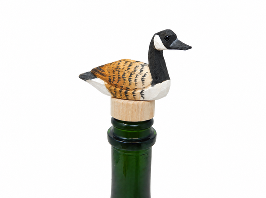 Canada Goose hand-carved wooden wine stopper by Selsela, on a plain background