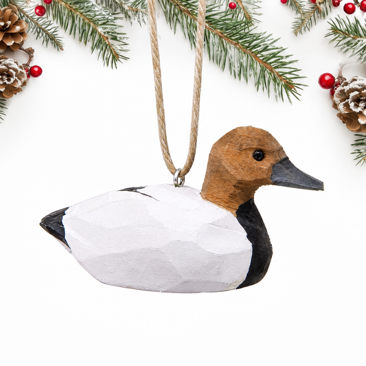 Canvasback Duck hand-carved wooden ornament by Selsela, on a plain background