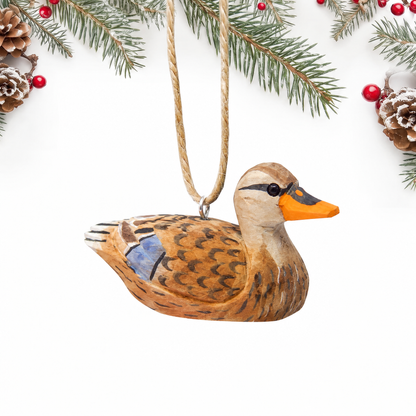 Mallard Duck Female hand-carved wooden ornament by Selsela, on a plain background