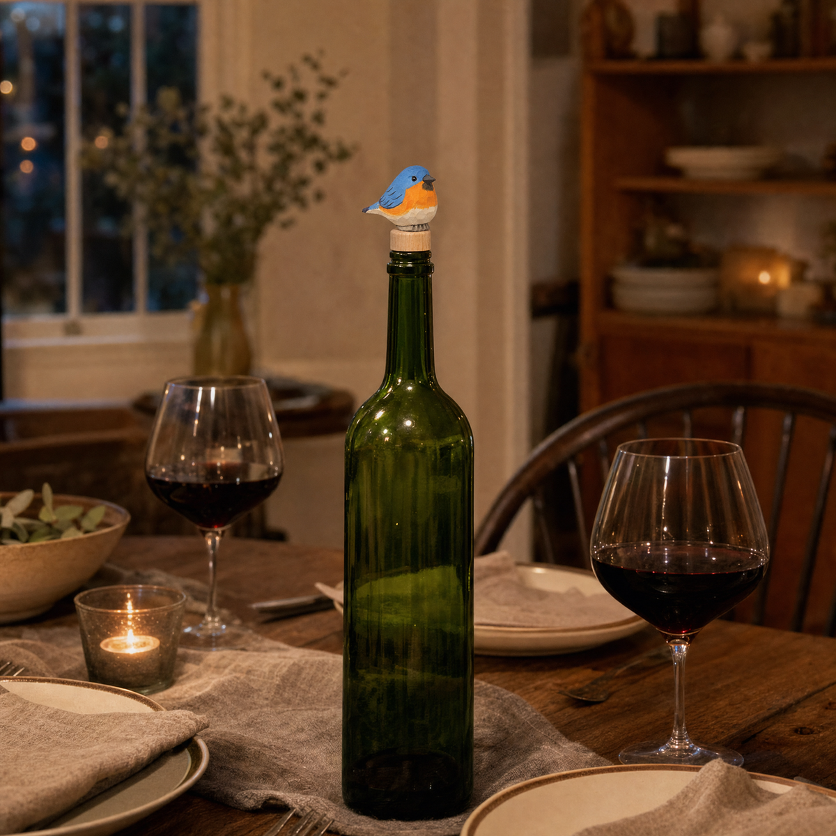 Eastern Bluebird hand-carved wooden wine stopper by Selsela, in a styled scene