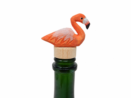 Flamingo hand-carved wooden wine stopper by Selsela, on a plain background