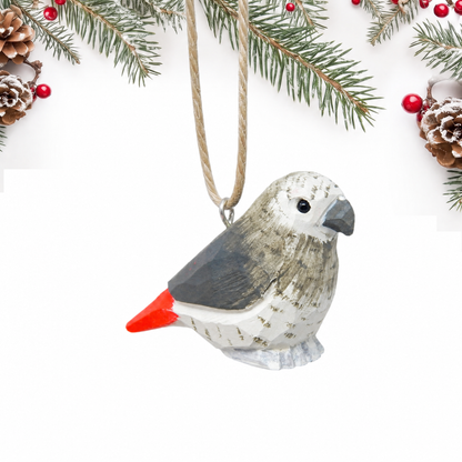 Grey Parrot hand-carved wooden ornament by Selsela, on a plain background