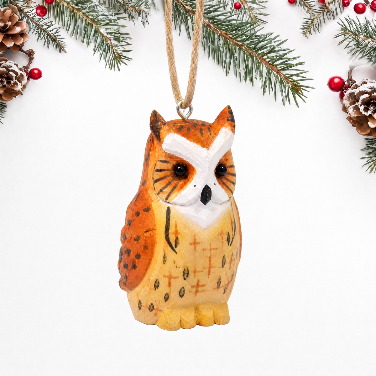 Great Horned Owl hand-carved wooden ornament by Selsela, on a plain background