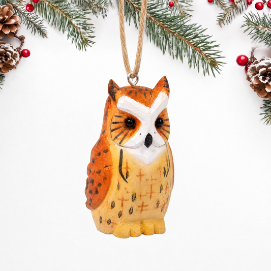 Great Horned Owl hand-carved wooden ornament by Selsela, on a plain background