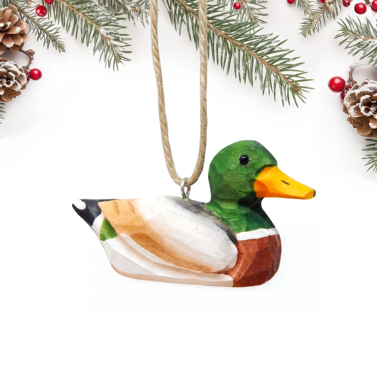 Mallard Duck Male hand-carved wooden ornament by Selsela, on a plain background