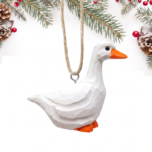 White Goose hand-carved wooden ornament by Selsela, on a plain background