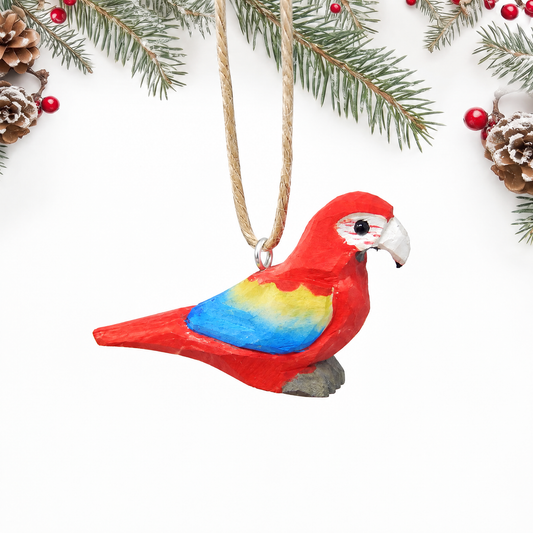 Macaw hand-carved wooden ornament by Selsela, on a plain background