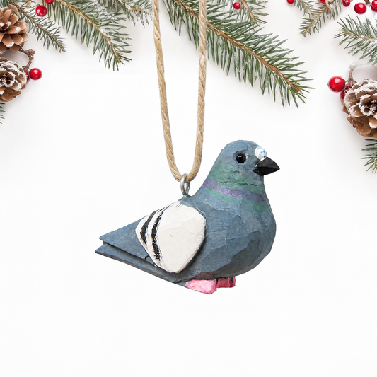 Pigeon hand-carved wooden ornament by Selsela, on a plain background