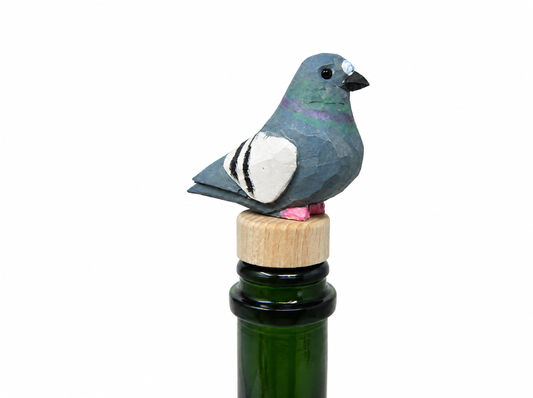 Pigeon hand-carved wooden wine stopper by Selsela, on a plain background